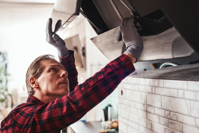 Technician Repairing Ducts
